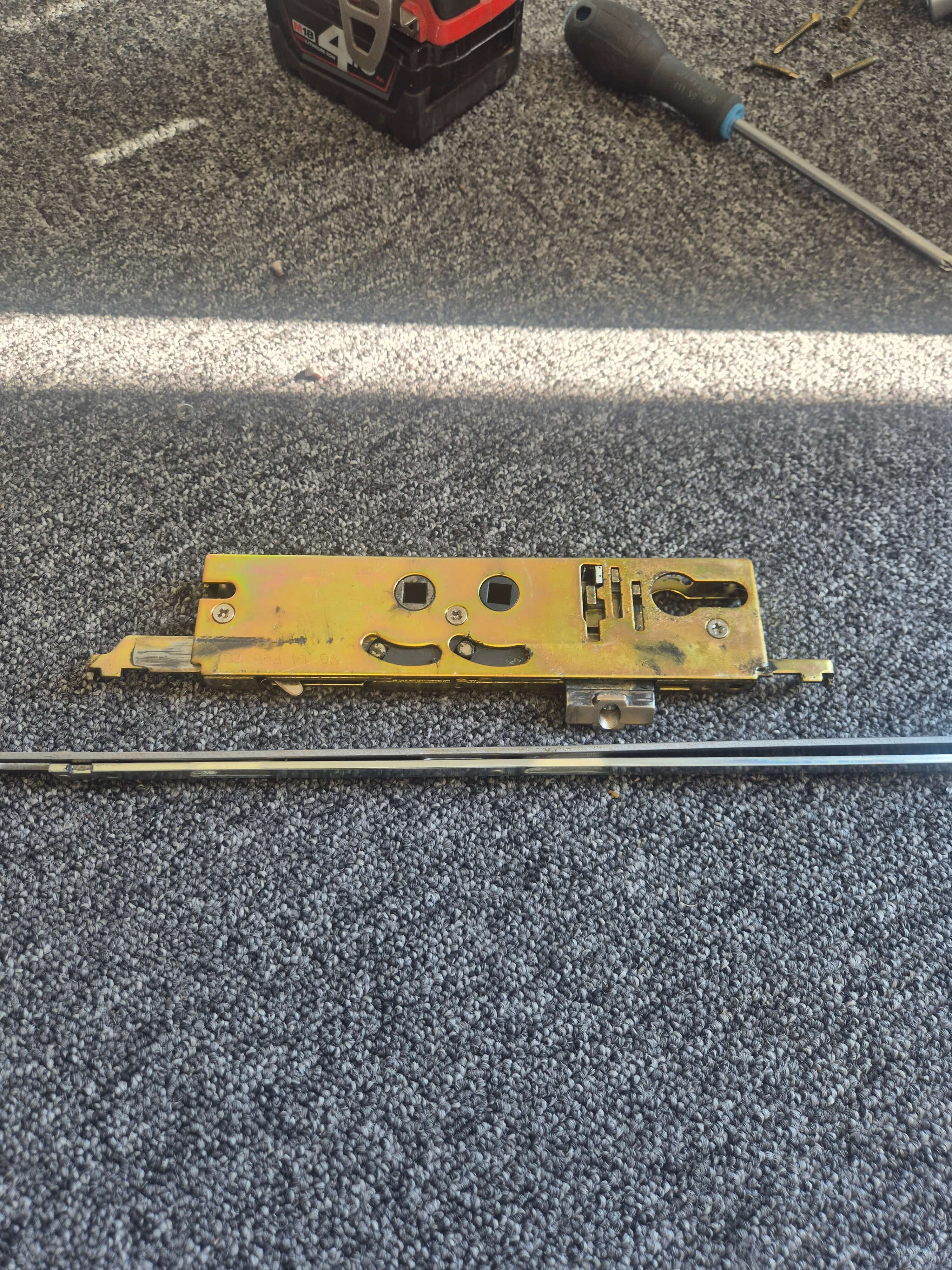 Yale G200 upvc door lock laid on grey carpet repaired